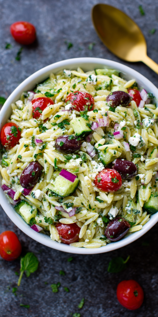 Creamy Pesto Orzo Mediterranean Salad served warm with cozy spices