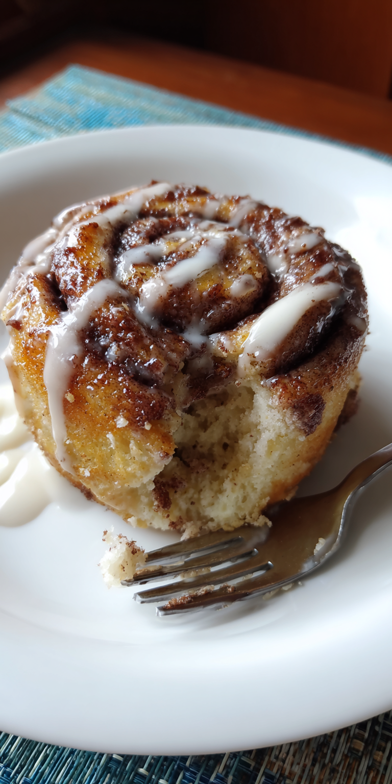 Keto Cinnamon Roll Mug Cake served warm with cozy spices