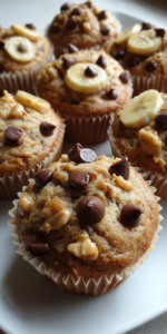 Peanut Butter Banana Chip Muffins served warm with cozy spices
